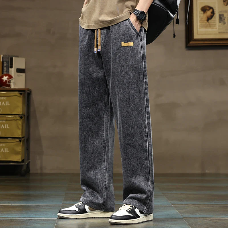 Jeansy męskie z troczkiem | Luźny krój | Styl streetwear | Wygodne spodnie na co dzień